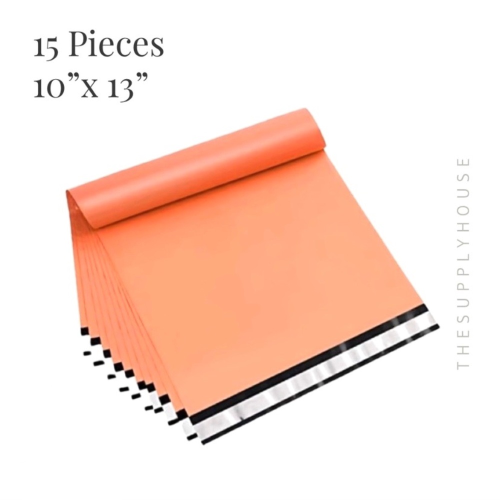 Orange 10x13 poly mailer shipping bag. Plastic waterproof shipping pouch.